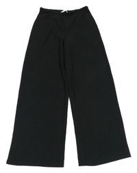 Černé mačkané volné kalhoty H&M