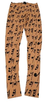 Oranžovo-černé legíny s notami 