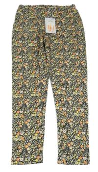 Nové - Černo-žluté květované volné kalhoty Name it