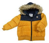 Okrovo-tmavomodrá šusťáková prošívaná zimní bunda s kapucí Gémo