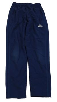 Tmavomodré šusťákové podšité funkční kalhoty s logem Adidas