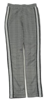 Šedo-černé vzorované tregíny s pruhem Y.F.K.