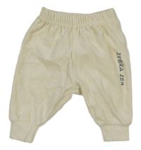 Smetanové sametové kalhoty s nápisem