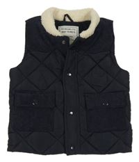 Tmavomodrá šusťáková prošívaná zateplená vesta Matalan