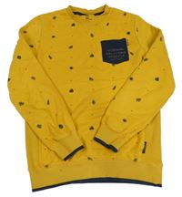 Okrová mikina s listy a kapsou