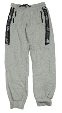 Šedé melírované tepláky s pruhem s nápisem H&M