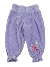 Fialové sametové tepláky s kytičkami Pusblu