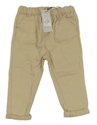 Nové - Béžové rifle s duhou Primark