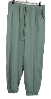 Nové - Dámské světlemodré harémové kalhoty George 