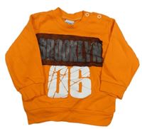 Oranžová mikina s číslem a nápisem a síťovinou 