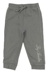 Šedé tepláky s nápisem a pruhem George