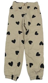 Hnědé tepláky se srdíčky H&M