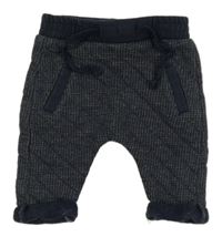 Tmavomodré vzorované tepláky 