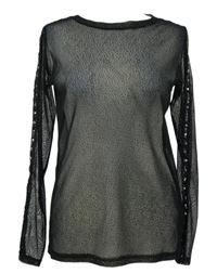 Dámské černé tylové triko s cvočky 