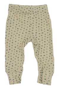 Béžové vzorované tepláky s kytičkami Zara