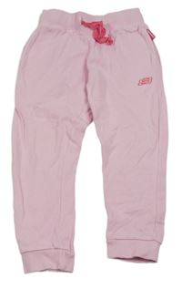 Růžové tepláky s logem Skechers
