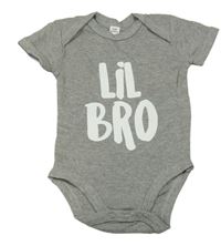 Šedé melírované body s nápisem 