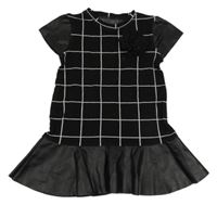 Černo-bílé kostkované šaty s květem a koženkou 