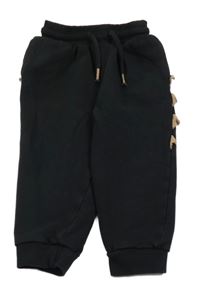 Černé tepláky s ostny Next