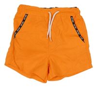 Neonově oranžové plážové kraťasy s nápisy 