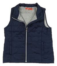 Tmavomodrá šusťáková prošívaná zateplená vesta Tissaia