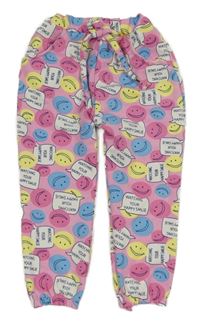 Růžové tepláky se smajlíky a nápisy 