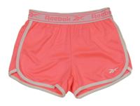 Křiklavě korálovo-bílé sportovní kraťasy s logy Reebok