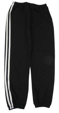 Černé sportovní tepláky s pruhy