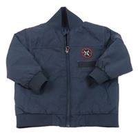 Tmavomodrý šusťákový zateplený bomber s nášivkou Quiksilver