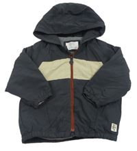 Antracitová šusťáková jarní bunda se smetanovým pruhem a kapucí Zara