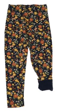 Tmavomodré teplákové legíny s kytičkami a motýlky C&A