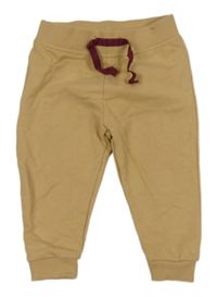 Béžové tepláky Ergee