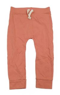 Růžové tepláky zn. George 