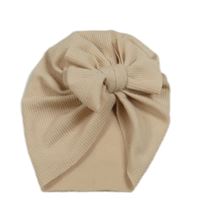 Pudrová turbanová čepice s mašlí 