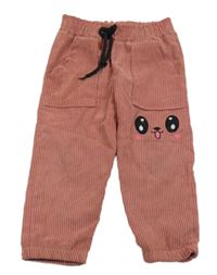 Růžové manšestrové kalhoty s obličejem