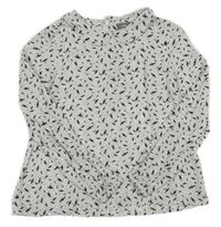 Bílo-černá vzorovaná halenka s bobóny 