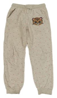 Béžovošedé tepláky se srdíčky a šelmou 