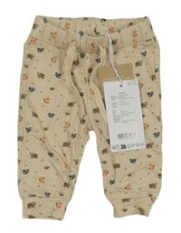 Nové - Béžové tepláky se zvířaty Name it