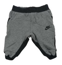 Šedo-černé tepláky s logem Nike
