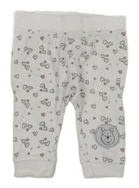Bílé srdíčkované tepláky s medvídkem Pú Disney