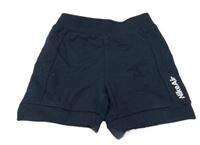 Tmavomodré teplákové kraťasy s logem Nike