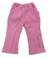 Růžové plátěné flare kalhoty s nápisy 