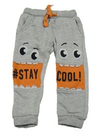 Šedo-oranžové tepláky s příšerkami a nápisem Kiki&Koko