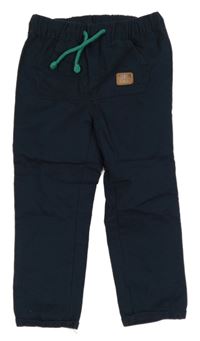 Tmavomodré plátěné kalhoty s kapsou a nášivkou