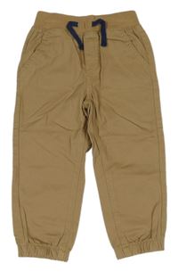 Béžové plátěné cuff kalhoty 