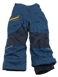 Petrolejovo-tmavomodré funkční oteplovačky s logem Quechua