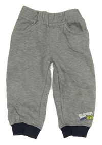 Světlešedé tepláky s nápisem Topomini