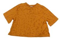 ORanžové vzorované crop tričko Nike