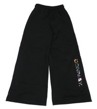 Černé široké tepláky s nápisem Donnay