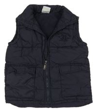 Tmavomodrá šusťáková zateplená vesta s kapsami Pocopiano